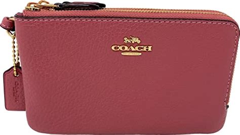 Amazon.com.mx: Muñequera Coach Doble Cremallera.